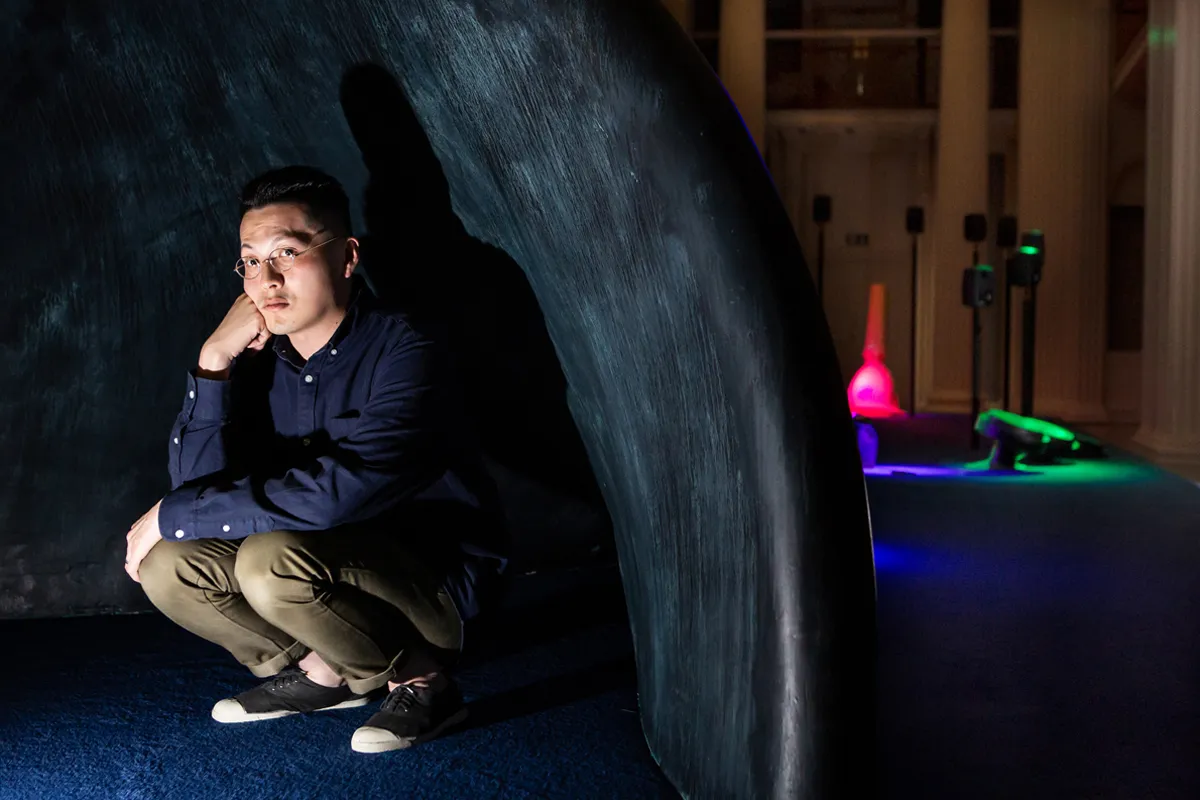 Samson Young in his exhibition